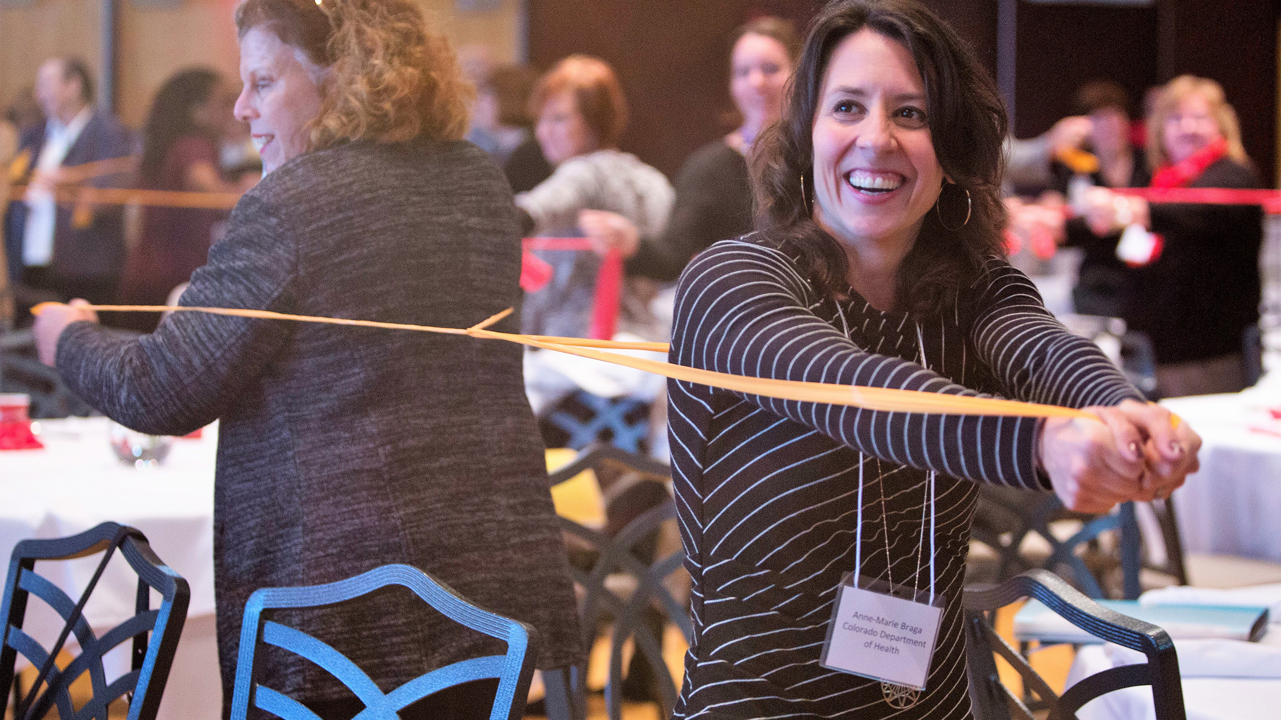 Several people engaging in a group activity at a BHAC summit